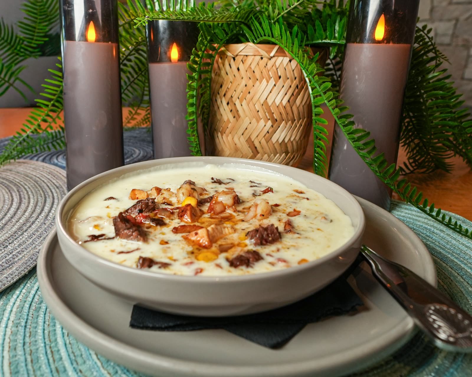Rosa Dip topped with grilled meat at Rosa Negra